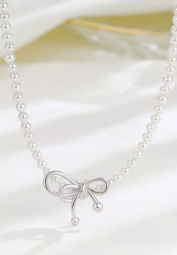 All You Need To Know About the Coquette Aesthetic 8 pearl necklace